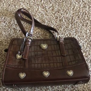 brown hard leather purse